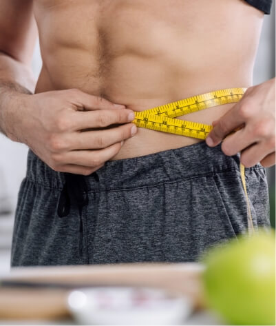 cropped-view-of-shirtless-man-measuring-waist-near-2023-11-27-04-54-19-utc (1)